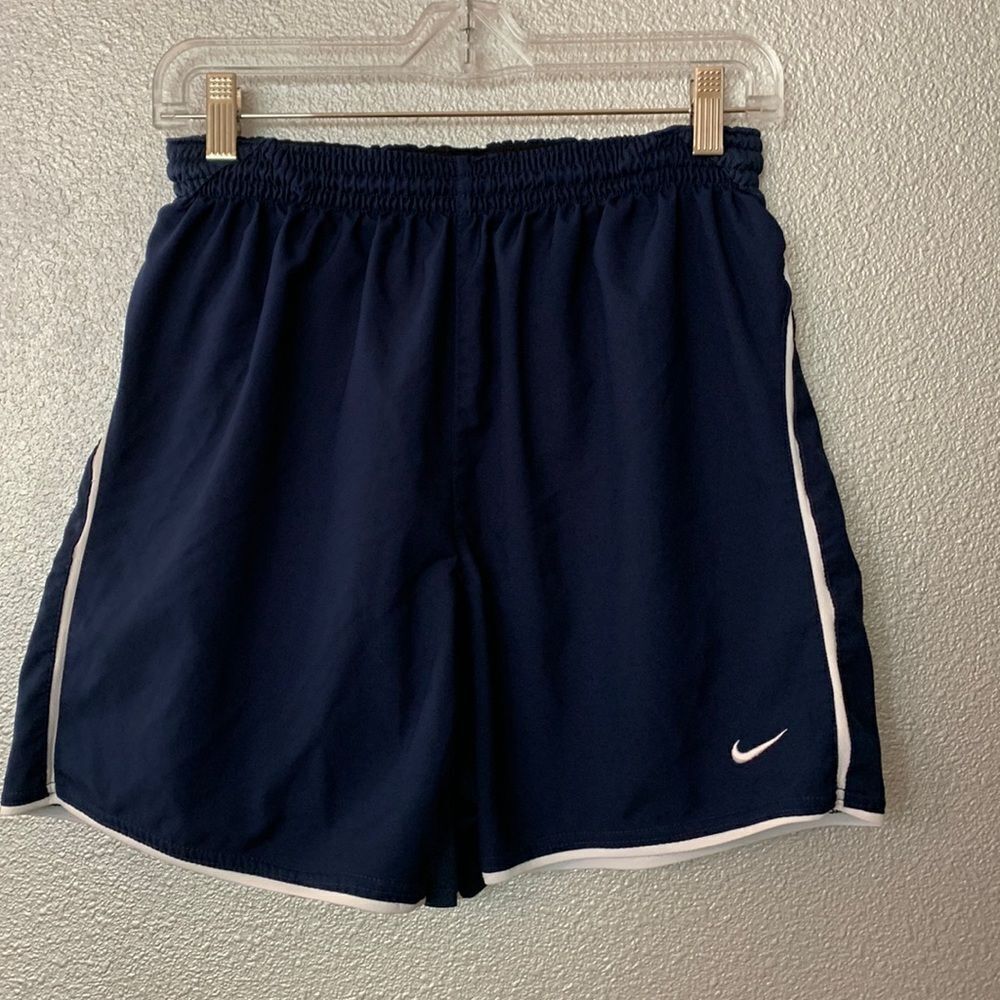 NIKE FitDry team shorts feature piping detailing and an elastic waist